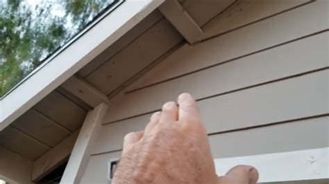 how to paint eaves wood